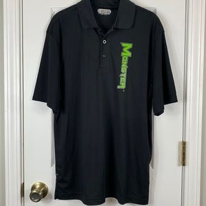NWOT Ontour black short sleeved polo shirt size medium. Green lettering MONSTER